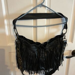 Black hundred percent leather fringe bag